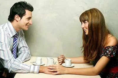 Couple talking gently over coffee
